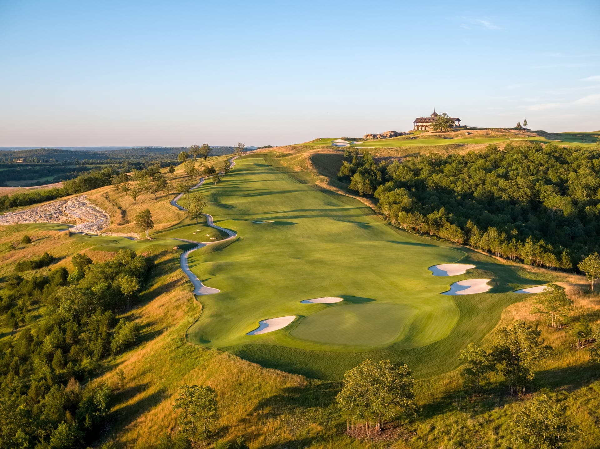 Aerial sunset view of the Big Cedar Lodge golf landscape in the Missouri Ozarks