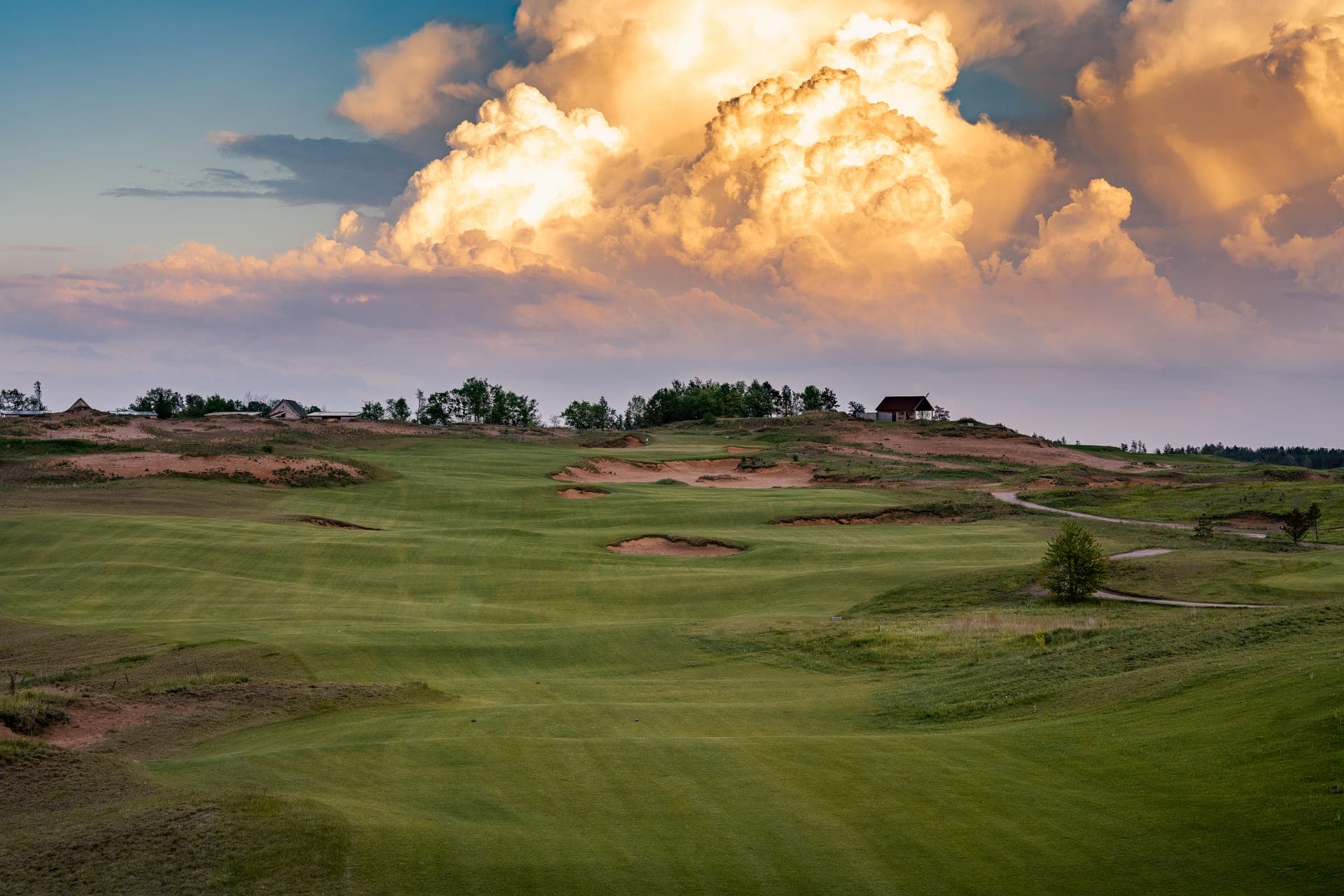 Aerial view of Sand Valley golf resort in Wisconsin, showing rolling sand dunes and fairways through native landscape