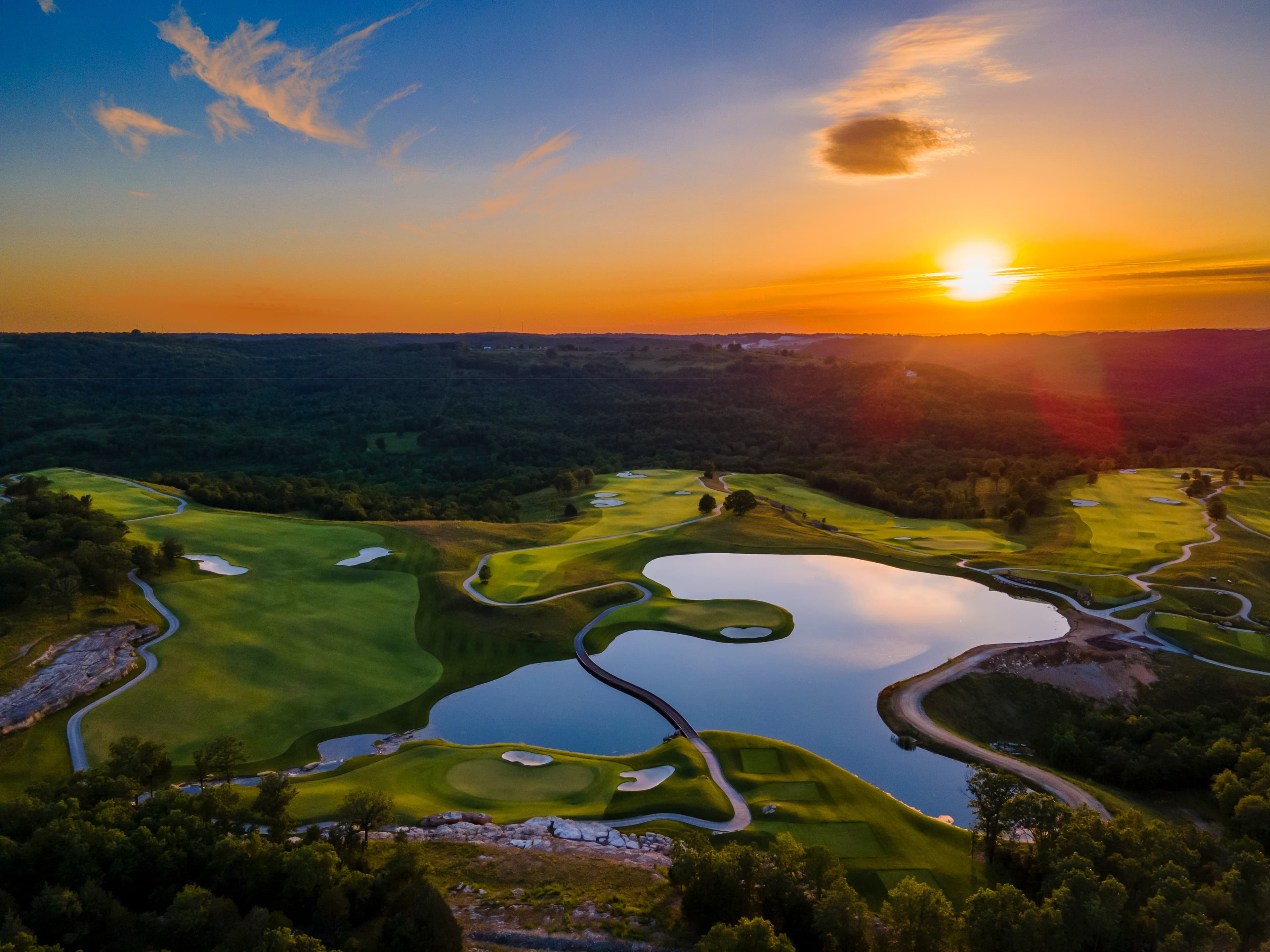 Aerial sunset view of the Big Cedar Lodge golf landscape in the Missouri Ozarks